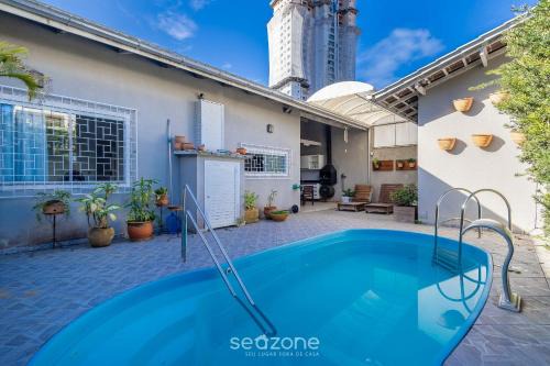 Praia da Armacao do Itapocoroi House | 2BR house w/pool & BBQ in Penha – TZS210