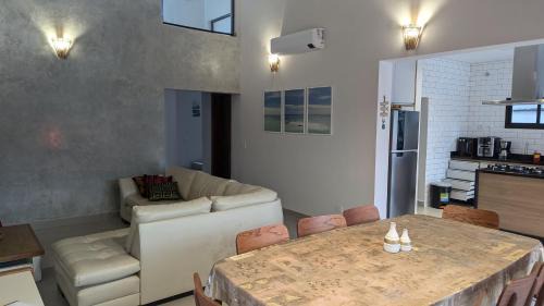 Costa do Sol House | 50m praia Cond pé na areia Alto padrao 4 suites Pisc Aquecida Segur 24h Costa do sol Guaratuba Bertioga prox Riviera