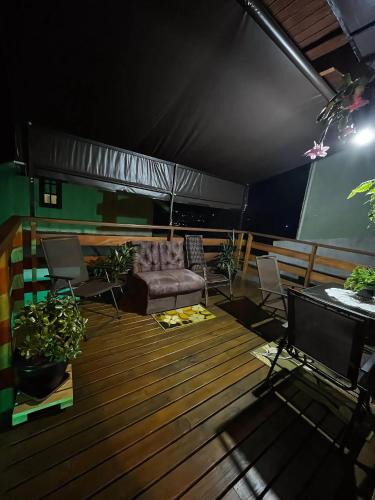 Vila Britania House | Aconchego da Jô - Experiência Aconchegante na Serra de Campos do Jordão
