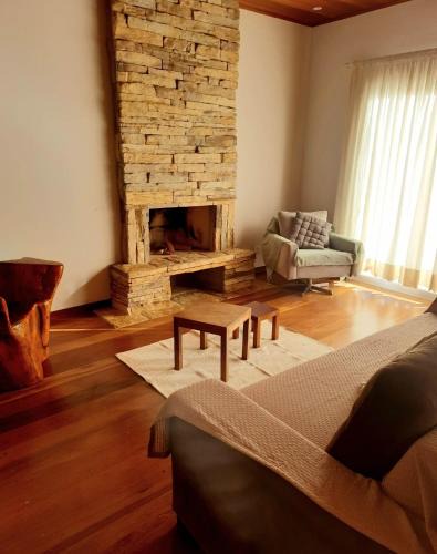 Vila Britania House | Casa com lareira e churrasqueira campos