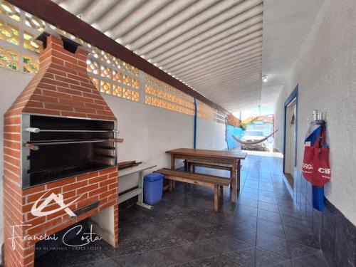 Jardim Remanso House | Casa com piscina no Indaiá em Bertioga - Para 8 pessoas