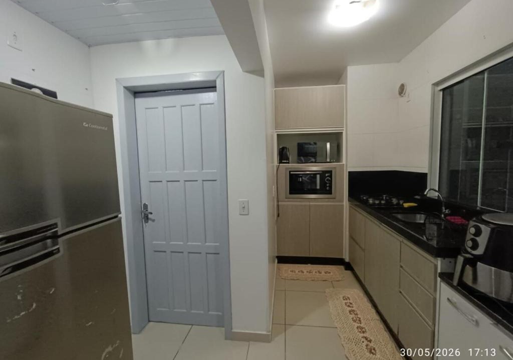 Poco Fundo Apartment | Casa com tres quartos e garagem