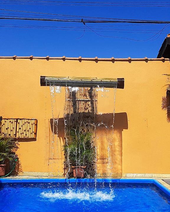 Jardim Santa Tereza House | Casa linda com Piscina e Jogos, pertinho da Praia