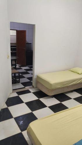 Jardim Virginia House | Casa2 a 7 minutos da praia Da ENSEADA de carro e 25 minutos de pé mais ou menos 2 Km da Praia