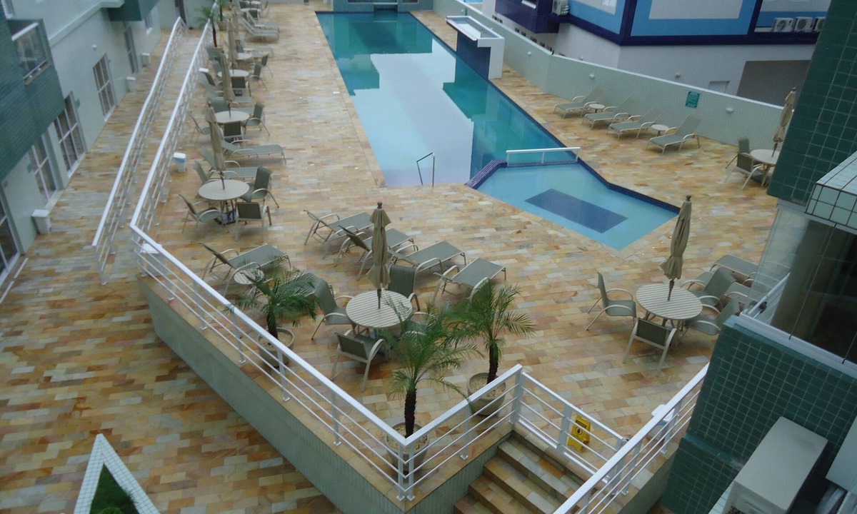 Praia Grande Apartment | Exclusive, upscale location with saunas, regular and heated pools, and fitness center.