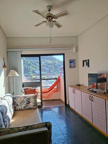 Santo Andre Apartment | Guarujá Enseada,2 quartos, ar, vaga 1 carro, praia à pé