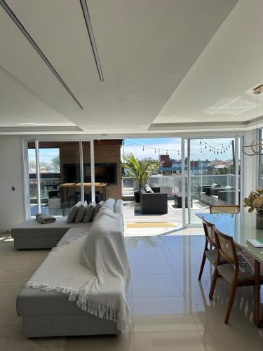Santinho Apartment | Magnífica cobertura vista mar