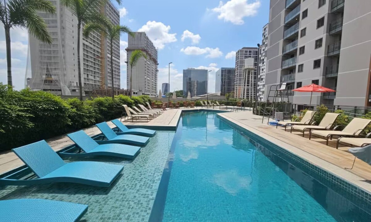 Santo Cristo Apartment | Modern studio apartment with ocean view, pool, and leisure facilities.
