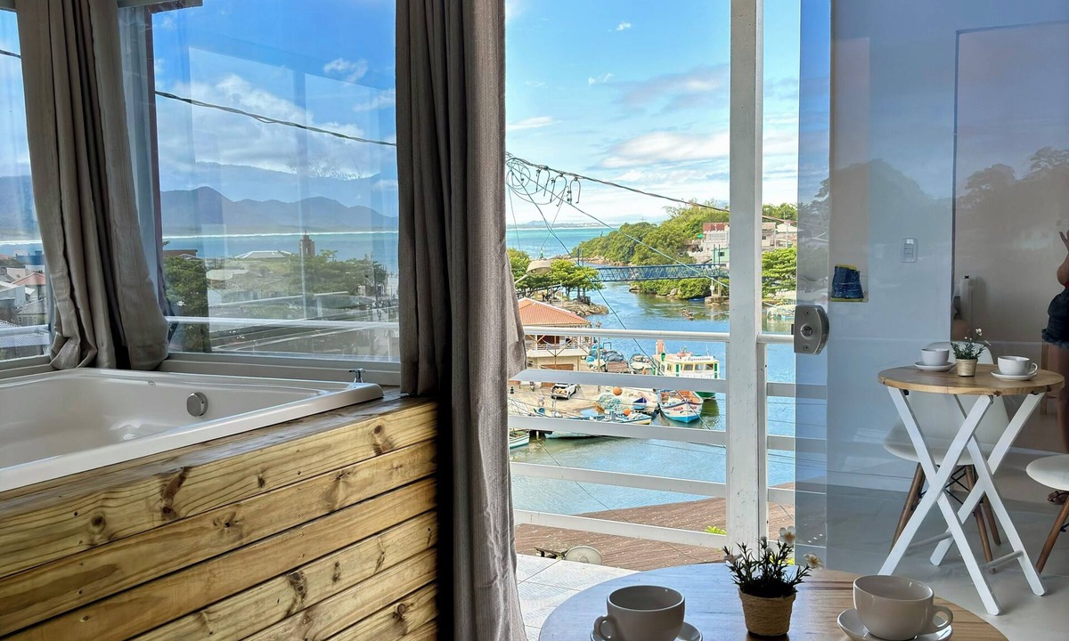 Florianopolis Apartment | Private Jacuzzi with ocean view.