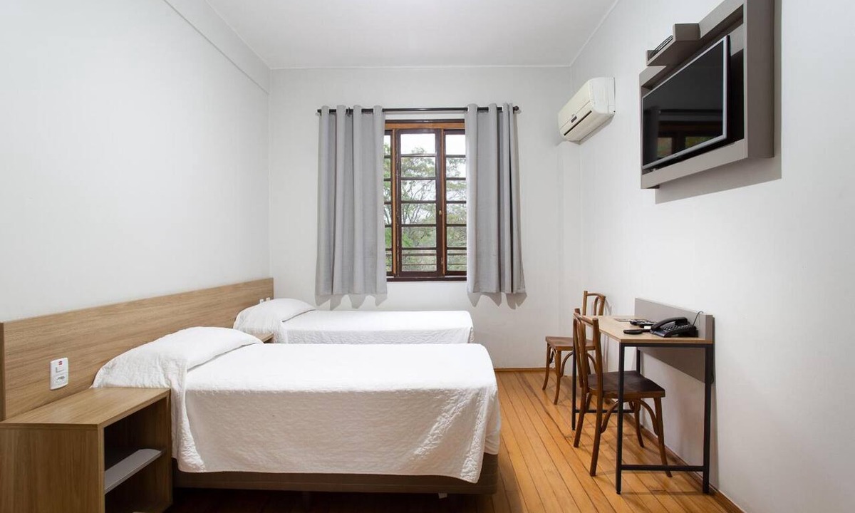 Nossa Senhora de Lourdes Hotel | Quiet & Relaxing Room Near Santa Maria Attractions | Free Breakfast & Parking