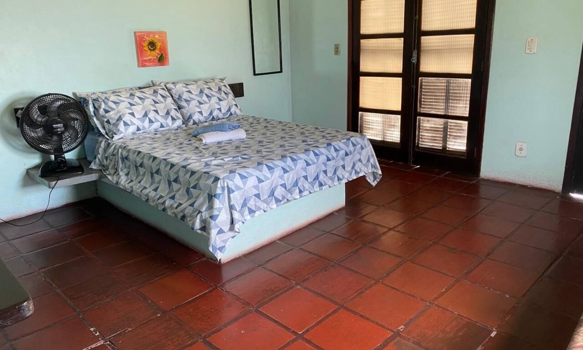 Iguaba Grande Apartment | Simple ground floor apartment with exclusive walkway to the lagoon.