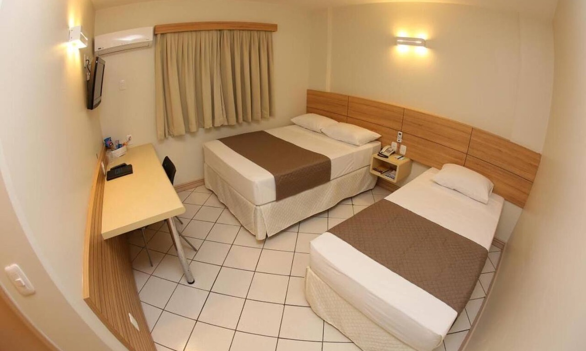 Umuarama Hotel | Simple Yet Practical Room l Close Orlando de Carvalho Airport - 3.1 miles