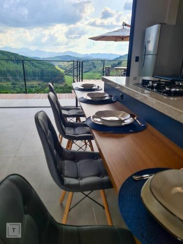 Itanhandu Villa | Solarium Mantiqueira - Conforto e vistas incríveis