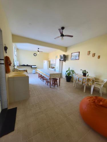 Piuma House | Suíte independente com cozinha e varanda