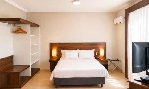 Atiradores Hotel | Suíte moderna e confortável no centro | Sauna & Garagem