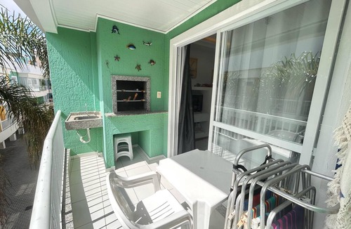 Bombas Apartment | 222, apartment in a gated community with a shared swimming pool.
