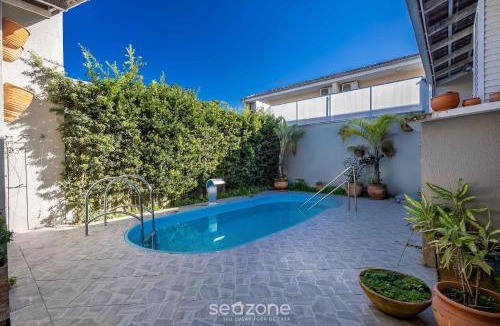 Praia da Armacao do Itapocoroi House | 2BR house w/pool & BBQ in Penha – TZS210