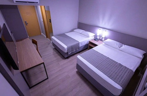 Centro Hotel | 4 Conveniently Located Pet-Friendly Rooms | Steps to Local Dining & Restaurants