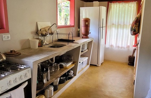 Ponte Branca House | A peaceful haven with a picturesque river right behind the house.