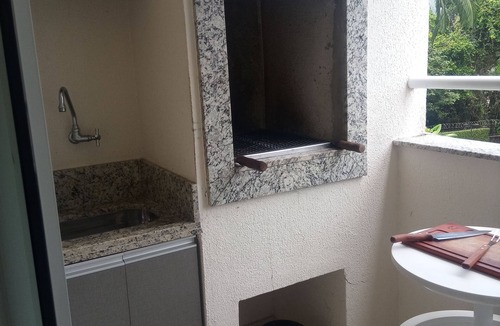 Itagua Apartment | A peaceful retreat, a cozy apartment with a pool, jacuzzi, and barbecue.