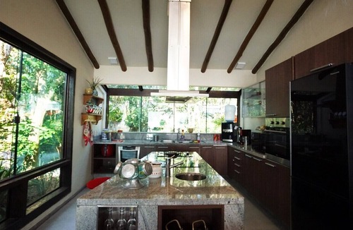 Caiacanga House | A retreat with panoramic views of the south of Florianópolis Island.