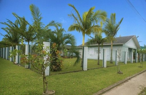 Arroio do Sal House | Amazing patio with pool and 4 bedrooms. Berti House: Garden House