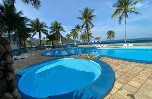Prainha Apartment | apartamento cobertura 4 dormitorios martim de sá em cima da areia e AR 64 C
