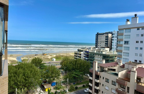 Capao da Canoa Apartment | Apartment with a view of the beach, next to Luiz Bassani square.
