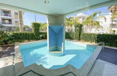 Jurere Apartment | Apartment with pool and balcony in Jurerê