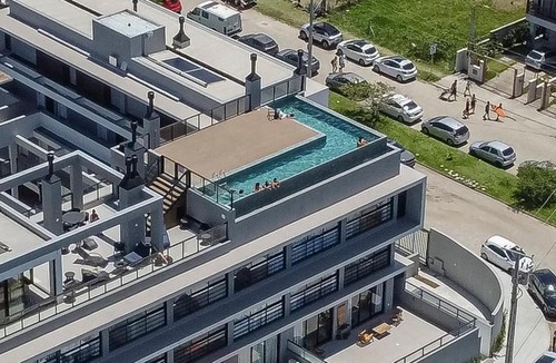Barra da Lagoa Apartment | Apt Tamar a 50m da praia da Barra by Achei Floripa