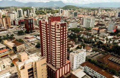 Centro Apartment | Apto confortável cozinha, smart tv