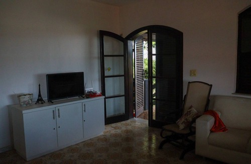 Areal House | Araruama Coconut Tree Corner