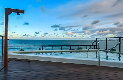 Jardim Oceania Apartment | Beachfront Gourmet Studio with Private Pool