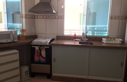 Centro Apartment | Beautiful beach in Praia dos Anjos with private barbecue, air conditioning, cable TV, WiFi, and beach view.