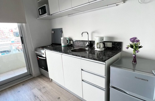 Almagro Apartment | Brand new studio in Almagro with rooftop terrace, bathtub and balcony | Hospital Italiano, audiovisual hub & Av. Corrientes