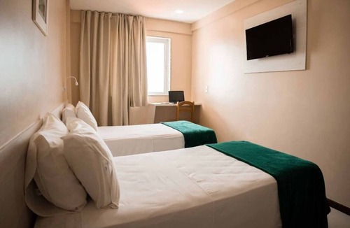 Jardim Flamboyant Hotel | Cabo Frio Beach Escape Near Dunas Beach w/Breakfast and Fitness Area