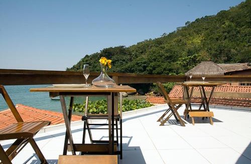 Trindade House | Casa 1 - Você a Varanda e o Mar na Praia dos Ranchos-Trindade Hospeda