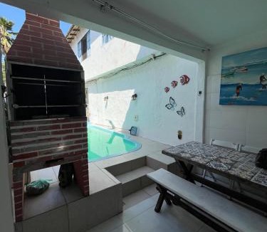 Ossos Apartment | Casa com piscina a 70 metros do mar