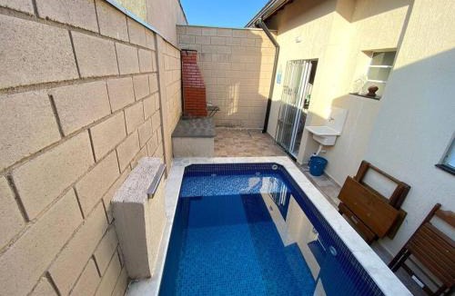 Tupy House | Casa de cond com piscina e churrasqueira particular