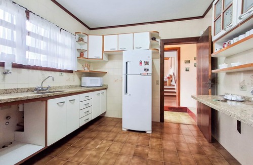 Jardim Nova Suica House | Casa em Campos do Jordao com lareira e aquecedor