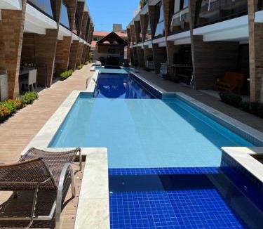 Poco House | Casa em condomínio na praia