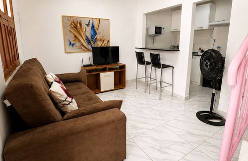 Cremacao House | Casa Laranja com Split e Wi-Fi 700 MB