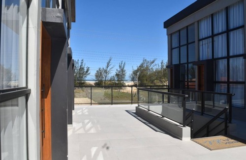 Jaguaruna Apartment | Charming 1-bedroom apartment steps to the Beach Jaguaruna with AC
