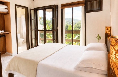Boicucanga Beach Apartment | Charming loft with a mezzanine, 2 balconies, and just 10 minutes from the beach
