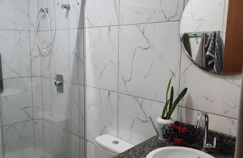 Armacao House | Comfortable suite on a quiet street near Armação beach.