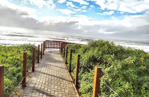 Barra Velha Apartment | Condomínio pé na areia com piscina aquecida
