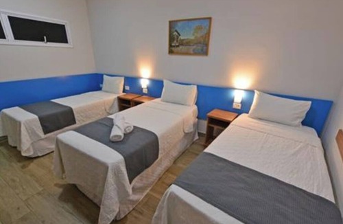 Iguacu Hotel | Contemporary Room Near Parque Ipanema - 1.9 miles | Free Parking & Breakfast