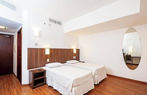 Centro Hotel | Conveniently Located Room Near Ponta do Tome Beach - 4.9 mi | Free Parking