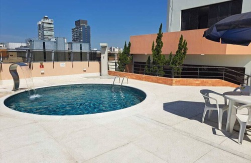 Gonzaga Apartment | Cosmopolitan Praia Flat