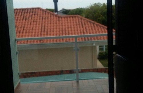 Capao da Canoa House | Excellent two-story house, 4 bedrooms, en-suite, sleeps 10, air conditioning, TV, Wi-Fi, near the beach and city center.